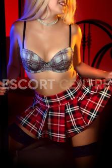 Scarlett looks excited in silver bra and tartan miniskirt